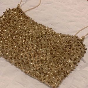 Sequenced gold crop top